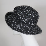 Roller Bowler, White Music Notes on Black, Size Medium